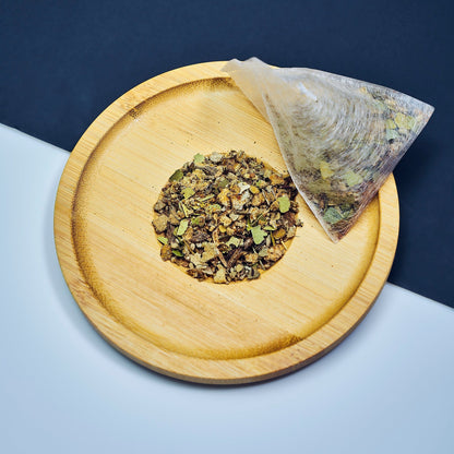 A close-up of the organic ingredients in Smooth September's Awakening Herbal Tea Blend, showcasing herbal tea blends rich in bay leaf, cayenne pepper, and mullein, a caffeine-free tea designed for holistic health.