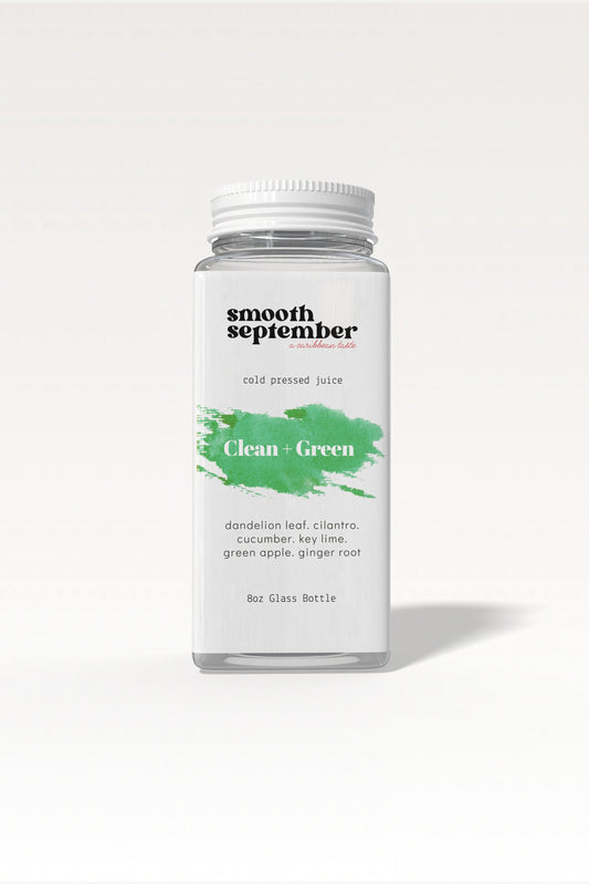 A bottle of vibrant, cold-pressed green juice with ingredients listed as dandelion leaf, cucumber, apple, and ginger. The background is clean and simple.