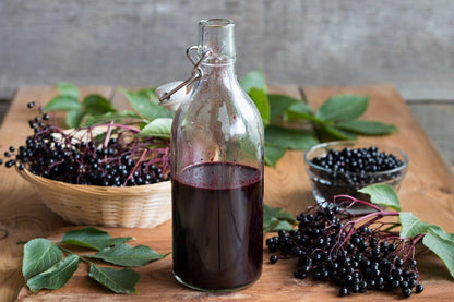 Close-up of Organic Elderberry Tonic Cold & Flu Relief by Elderberry Tonic, showcasing its herbal tea blends and infusions, designed for a natural and caffeine-free health boost.