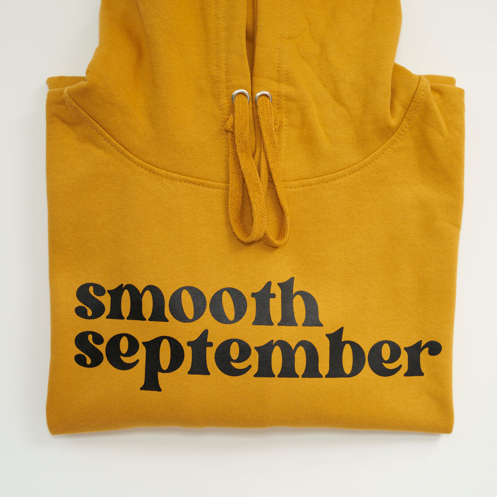 Smooth September HoodySmooth September Hoodies, the perfect blend of style and comfort that will effortlessly elevate your wardrobe. The super-soft fabric ensures maximum coziness, while Smooth September, LLCMerchandiseBranded Apparel